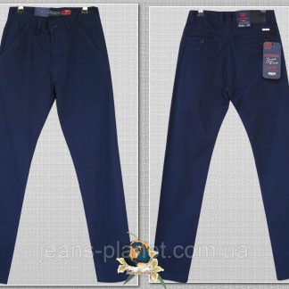 Джинси завужені підліткові однотонного синього кольору 23-й розмір