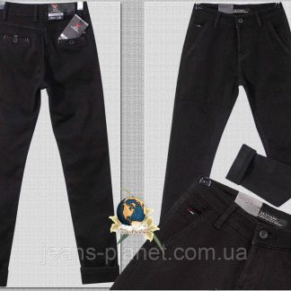 Модні утеплені джинси з косими кишенями чорного кольору на хлопчика підлітка